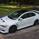 Illustration for article titled Lets Ogle The Mitsubishi Lancer Evo X One Last Time Because Its Going Away Forever